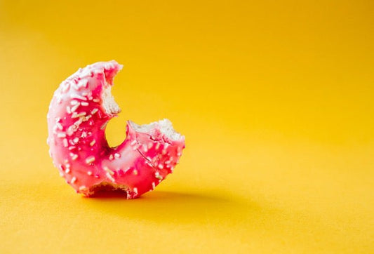 Ein angeknabberter Donut